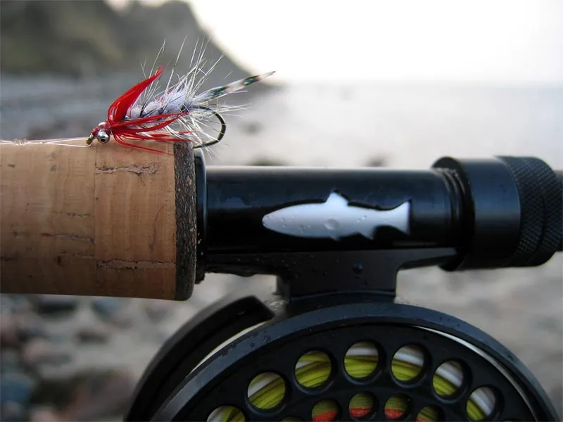 Blood Nosed Magnus - The signature fly for <a href="/podcast">our podcasts</a> - the Magnus with a red front hackle